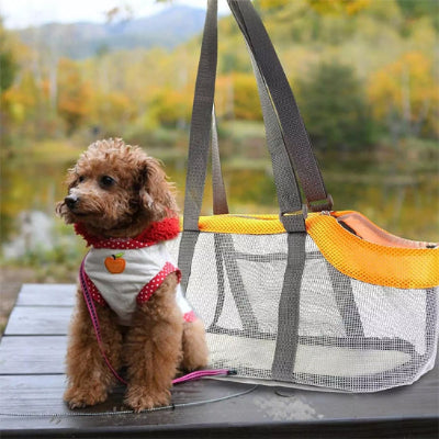 Chien sac de transport DogRier côté orange chien
