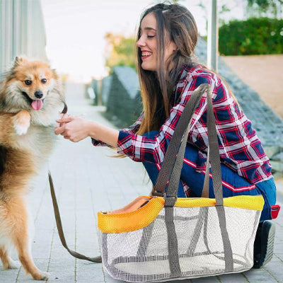 Chien sac de transport DogRier orange penché chien