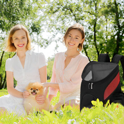 Sac à dos pour chien canpack noir deux femmes chien